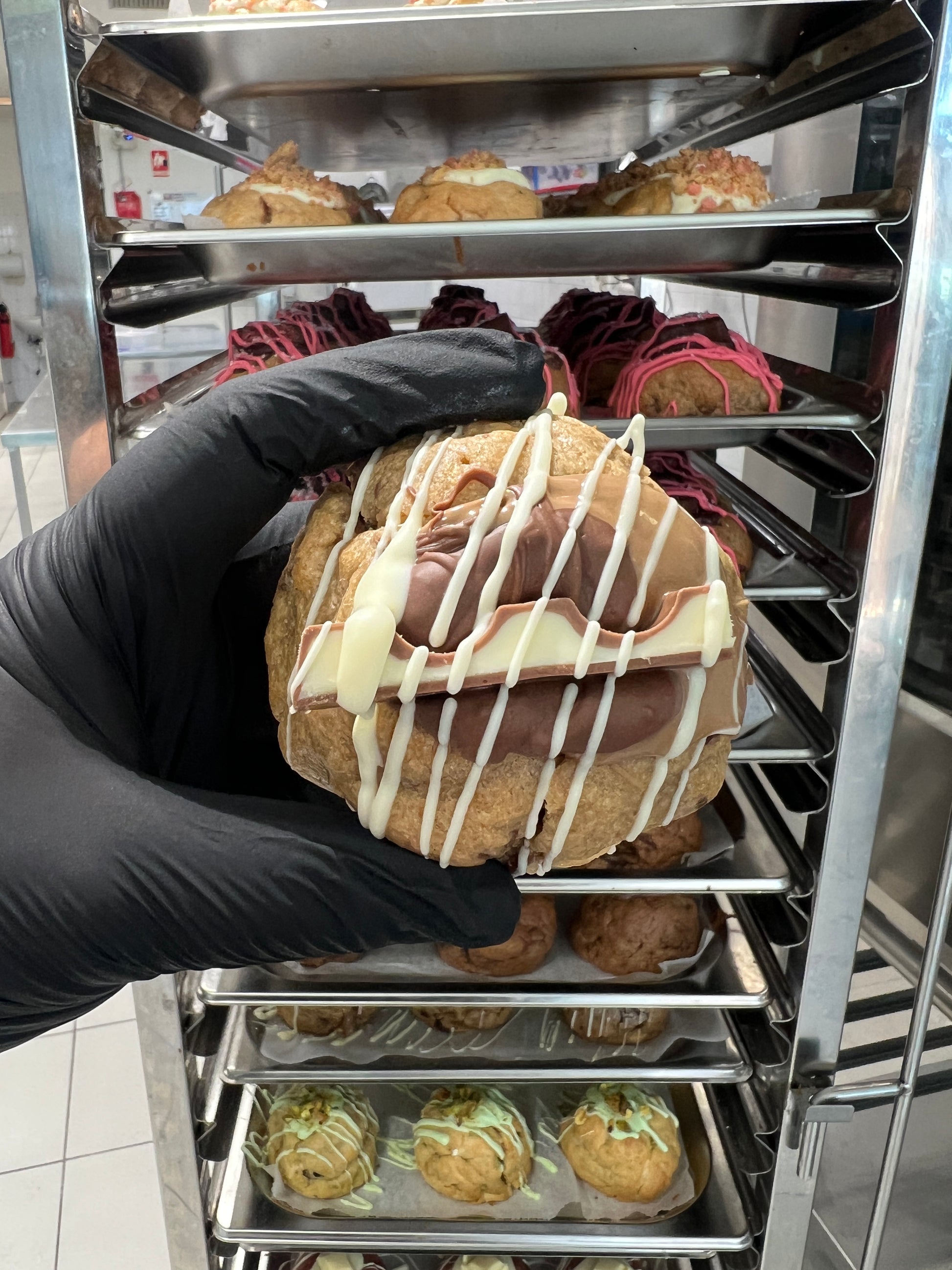 Top view of the Kinder Bueno cookie, showcasing the smooth chocolate topping and perfect golden edges.